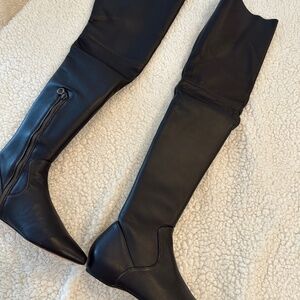Leather knee to thigh high boots in a dark chocolate color